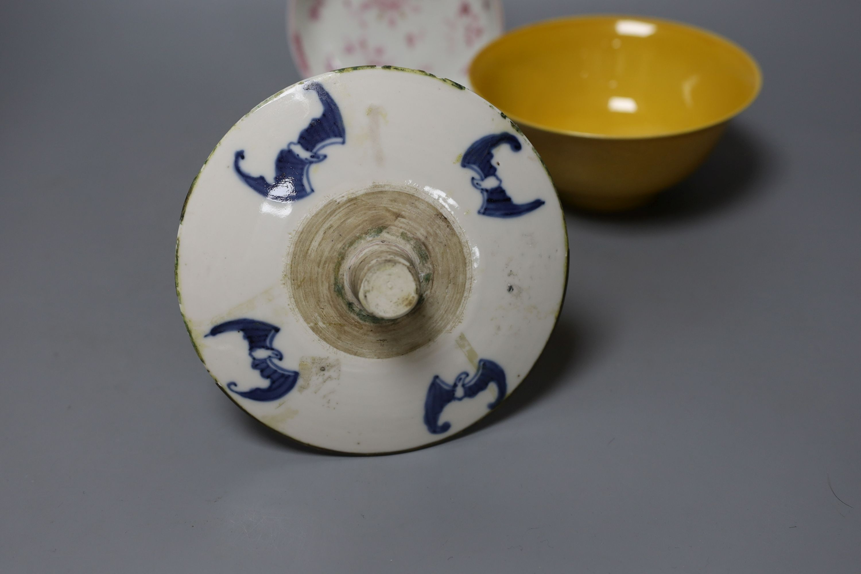 Three Chinese ceramics, including a yellow bowl with inscription to base, 7cm tall, blue and white dragon pattern candlestick mount and export dish